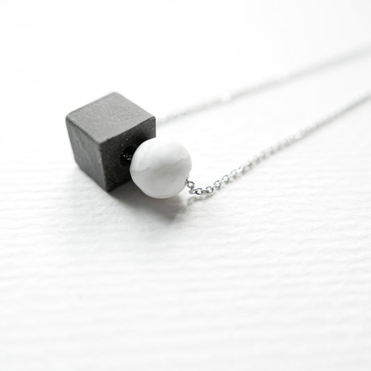 Dark Grey Concrete Cube Necklace mit Howlite